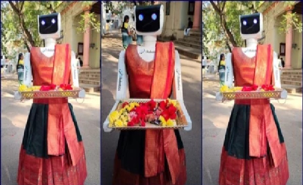 కోయంబత్తూరు పోలింగ్ కేంద్రంలో సంప్రదాయ దుస్తుల్లో ఓటర్లను ఆహ్వానించిన ‘టినా’ రోబో!