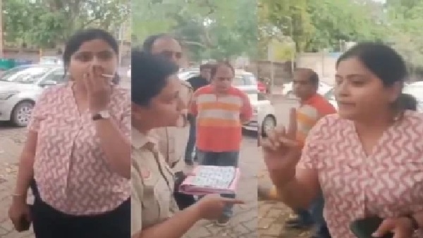 ముందు బోర్డు చూపించండి, ఆ తర్వాతే ఫైన్ వేయండి: సిగరెట్ తాగుతూ మహిళా పోలీసుతో యువతి గొడవ; వీడియో వైరల్!