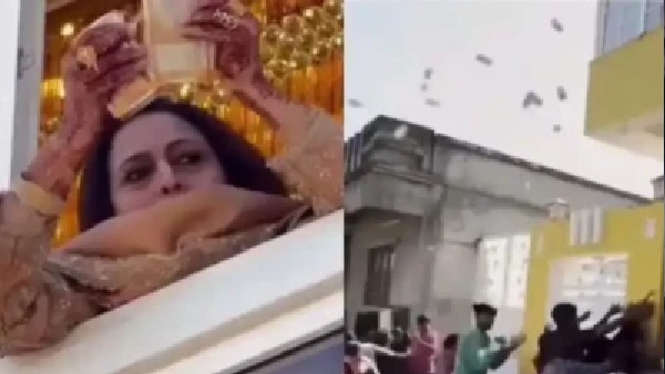 బాల్కనీ నుండి రూ. 200, రూ. 500 నోట్ల ‘ధన వర్షం’.. కట్టలు విసిరేసిన మహిళ; వైరల్ వీడియో!
