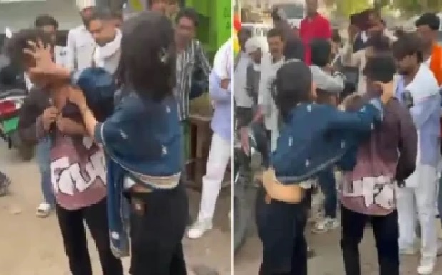 నడిరోడ్డుపై భార్య కొడుతుంటే చూస్తూ ఉండిపోయిన జనం! “నేను తిరిగి కొడితే నేనే అపరాధిని అవుతాను” అంటూ భర్త ఆవేదన.. వీడియో వైరల్!