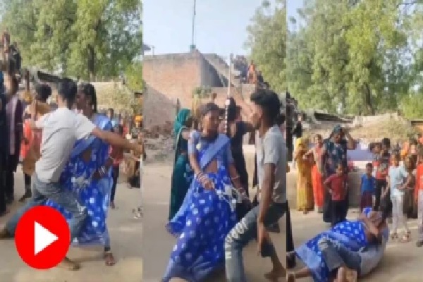 గ్రామ వీధుల్లో ఊర మాస్ డ్యాన్స్; యువకుడిని కౌగిలించుకుని రోడ్డుపైనే పడుకున్న మహిళ.. ఆగని స్టెప్పులు! వైరల్ వీడియో