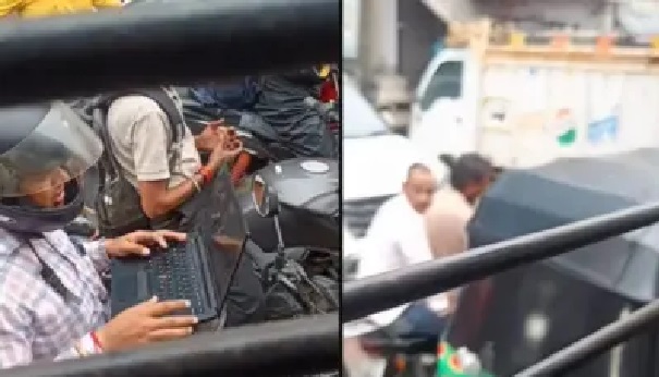 5 నిమిషాల ట్రాఫిక్ సిగ్నల్. బైక్‌పైనే ల్యాప్‌టాప్ తెరిచిన యువకుడు! ‘మనం మనషులమా లేదా నడిచే యంత్రాలమా?’ సమాజాన్ని తీవ్రంగా ఆలోజింపజేసిన వైరల్ ఫోటో..!!