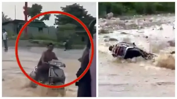 ముంచెత్తిన భారీ వర్షం..! రోడ్డుపై నదిలా ప్రవహించిన వరద. బైక్పై దూసుకెళ్లిన వ్యక్తి. రెప్పపాటులో యముడిని చూసిన ఘటన. వణికించే వీడియో.!!