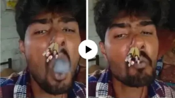 ముక్కులో 8 బీడీలు..! నోటి నుంచి పొగ.. క్యాన్సరే ఇతన్ని చూసి పారిపోయేలా ఉందే.. రీల్స్ పిచ్చితో విచక్షణ కోల్పోతున్న యువత.. వీడియో చూసి దుమ్మెత్తిపోస్తున్న నెటిజన్లు.!